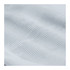 A textured close-up of fabric in a light grey hue, featuring a subtle grid pattern.