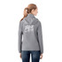 A packable women's rain jacket in grey with a hood and a logo on the back.
