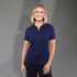 A navy blue women's polo shirt featuring a collar and a logo. The model stands against a neutral backdrop.