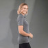 A grey women's polo shirt, featuring a fitted design and a branding logo, displayed against a neutral background.
