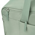 A green duffle bag features a zipper and straps, with pockets on the side and a logo.