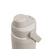 A drink bottle in light grey with a screw top and a flip-open spout, featuring a logo.