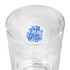 A clear glass carry cup featuring a decorative design inside and a smooth surface. It has a logo on the inside.