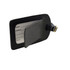 A black luggage tag with a transparent window for contact information and a buckle strap. It has a simple, sleek design.