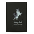 A black refillable journal with a design featuring a jumping dog and text for "Happy Tails Doggy Daycare."