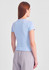 A women's baby tee in light blue, featuring short sleeves and a fitted design, with a logo on the back.