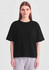 A black box tee shirt with short sleeves displayed on a model against a plain background.