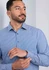 A classic fit long sleeve shirt in blue and white stripes, featuring button cuffs and a logo on the sleeve.