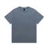 A heavy faded tee in a muted blue colour with a crew neckline and short sleeves, featuring a logo label.
