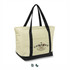 A large cream cooler bag with black straps and a logo on the front.