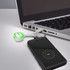 A white Zodiac Charging Cable connects to a laptop, with a smartphone displaying a charging indicator.