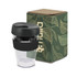 A drink bottle featuring a clear body, black lid, and band, accompanied by a decorative box.