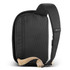 A black sling bag with a tan strap and a zipper pocket, featuring a logo on the strap.