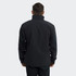 A unisex soft shell jacket in black, featuring a high collar and a simple design. The jacket has a logo on the back.