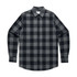 A button-up shirt in black and grey checkered pattern, featuring long sleeves and a collar. Logo present.