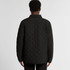 A black quilted puffer jacket with a diamond pattern, viewed from the back on a model.