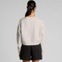 A light grey crop crew jumper viewed from the back, paired with black shorts. The design features a simple silhouette and a logo.