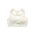 A cream-coloured crop top with a racerback design, featuring a logo.