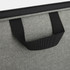A grey satchel with a black handle, featuring a textured fabric and zipper closure. It has a logo on the material.