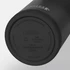 A drink bottle in matte black with a stainless steel bottom, featuring a logo on its underside.