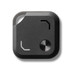 A black Bluetooth tracker featuring a metal button and a small opening, with a minimalist design.