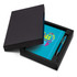 A blue notebook and pen set displayed in a black gift box. The notebook features a logo and the set includes branding on the pen.