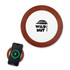 A round, wooden wireless charger in brown and white, featuring a logo, alongside a smartphone displaying charging status.