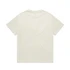 A plain cream Heavy Tee t-shirt featuring short sleeves and a simple design, with a logo present.