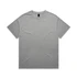 A plain grey t-shirt with short sleeves and a tag at the neckline. It features a simple design and has a logo.