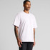 A purple Heavy Tee t-shirt displayed on a model, featuring a relaxed fit and short sleeves.