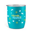 A teal drink cup with a lid, featuring croissant and coffee cup patterns, and a branding logo.