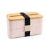 A pink eco lunch box with a bamboo lid and black strap, featuring two compartments and a branding logo.