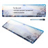 A dry erase board featuring a blue and white design with a mountain and city skyline, along with a marker.
