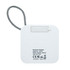 A white Bluetooth speaker with a textured strap and branding on the back. The speaker features a flat, square design.
