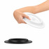 A hand holds a white pet bowl above a black base, showcasing a two-piece design for easy assembly and use.