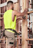 Men's summer cargo shorts in khaki, featuring multiple pockets, worn by a person in a bright yellow sleeveless top.