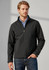 A man wearing a black soft shell jacket, standing against a neutral background, featuring a logo on the jacket.