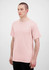 A light pink men's short sleeve t-shirt displayed on a model, featuring a plain design and a logo.