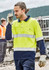 A men's high visibility long sleeve polo in bright yellow and navy, featuring reflective hoop tape and a pocket.