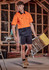 A short sleeve work shirt in hi-vis orange and navy blue, designed for safety and visibility in construction settings.