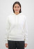 A white women's hoodie featuring a front pocket and drawstring hood, displayed on a model against a neutral background.