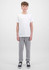 A pair of grey track pants with ribbed cuffs, displayed on a model wearing a white t-shirt and black shoes.