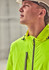A vibrant yellow packable rain jacket is worn by a person looking upwards, complemented by a hard hat.