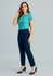 A woman stands wearing a turquoise top and navy slim leg pants, paired with black high heels. The image features a branding logo.