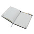 A black A5 notebook with lined pages, featuring a ribbon marker and a small logo on the cover.