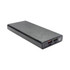 A black wireless power bank with a textured finish and multiple charging ports. It features a digital display.