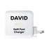 A white 100 watt GaN quick charger with a plug, featuring a logo and text design.