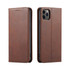 A brown leather iPhone case with a folio design, featuring a logo and openings for buttons and ports.