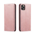 A pink folio iPhone case with a sleek design, featuring a subtle logo and neatly arranged compartments for cards.