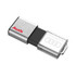 A silver and black flash drive featuring a transparent casing and a logo.